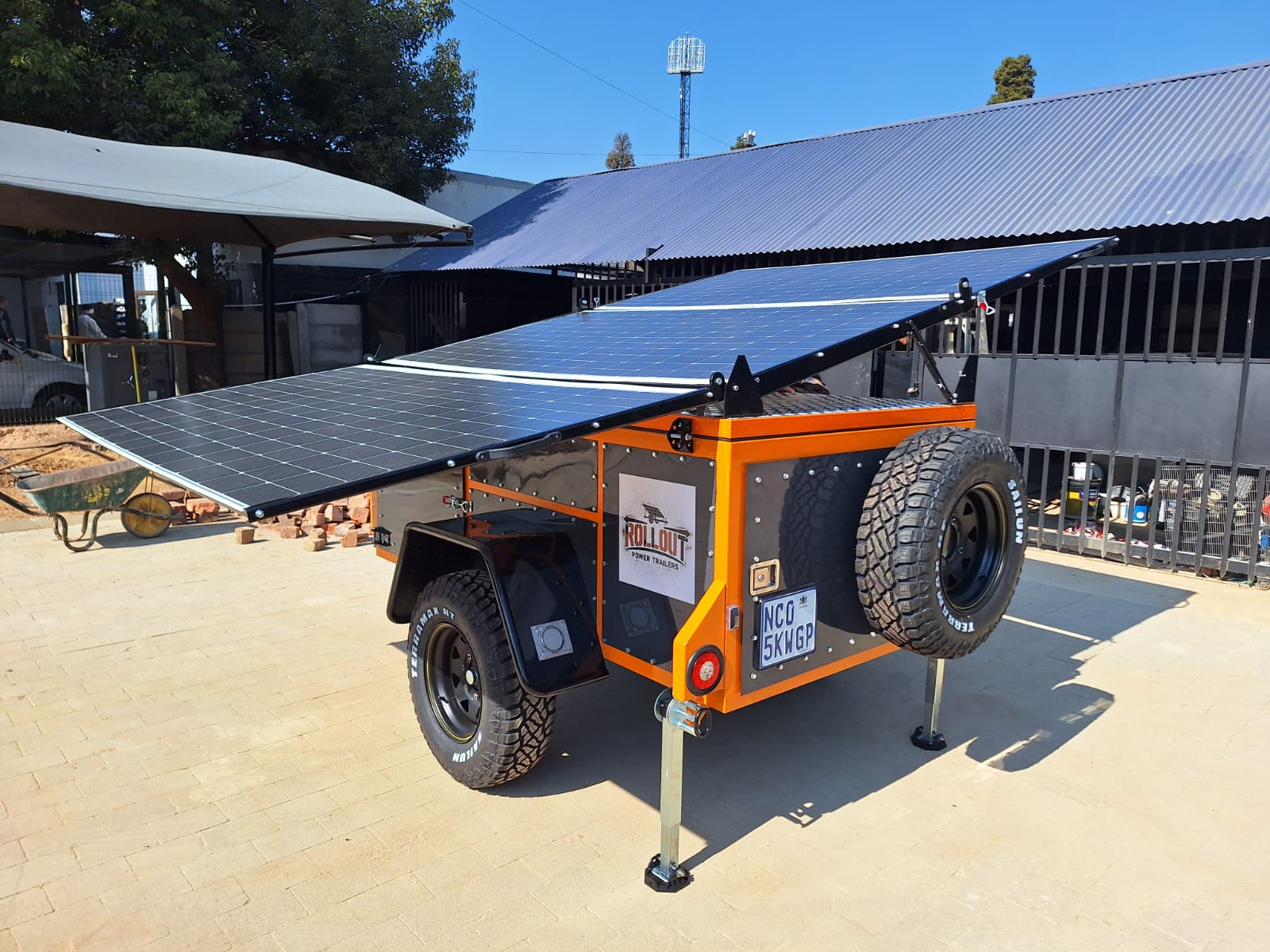 Rollout trailer panels fully unfolded on-site